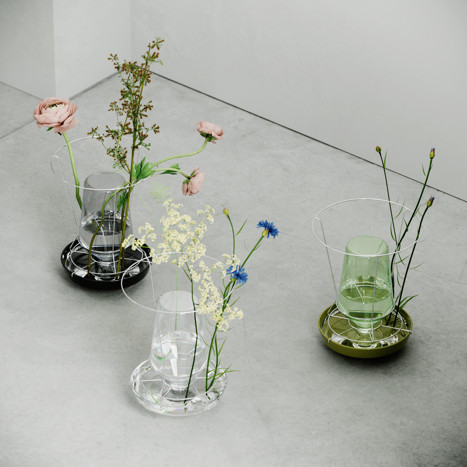Three unusual vases with flowers