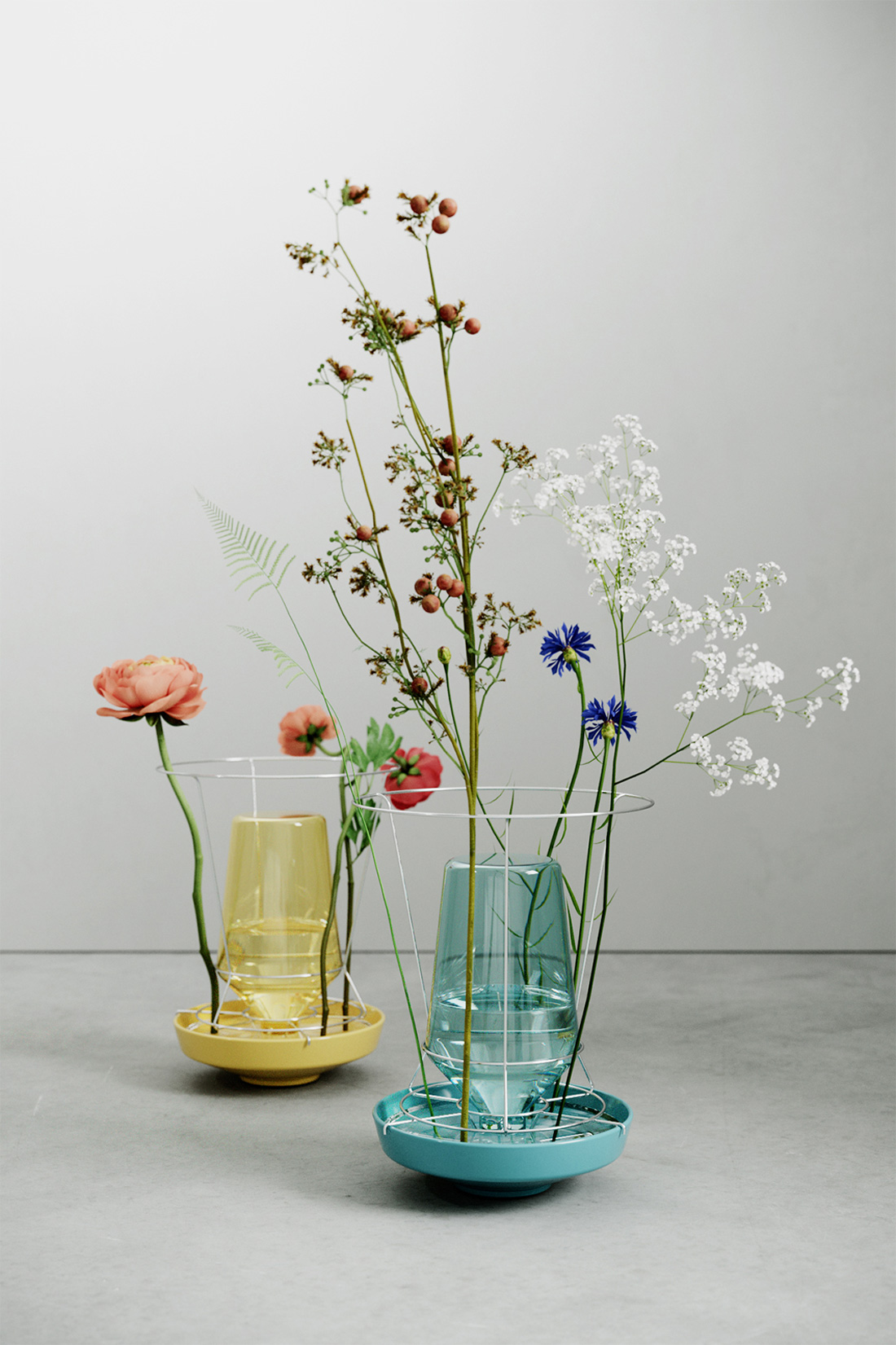 Three unusual vases with flowers